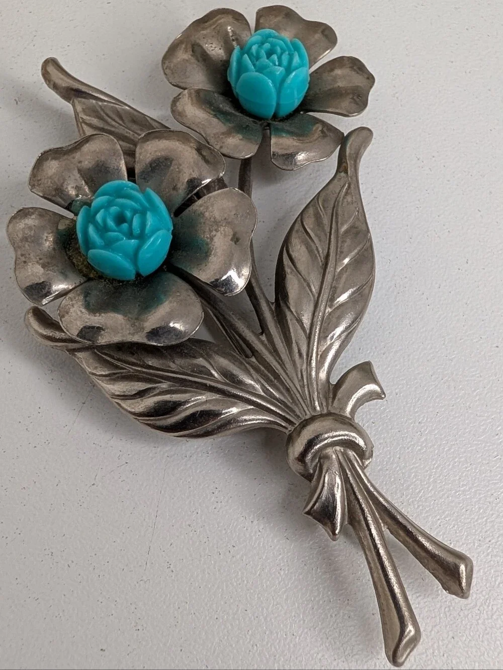 Silver Tone Floral Brooch with Molded Turquoise Resin Roses